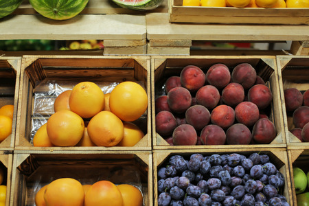 Assortment of fresh fruits at marketの写真素材