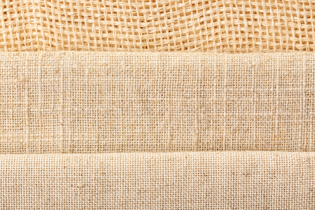 Folded hemp cloth texture, closeup