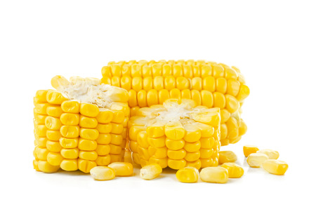Pieces of fresh corn cob, isolated on white background
