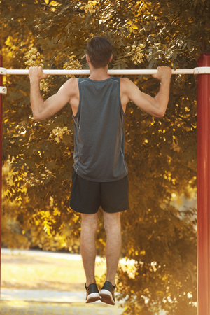 Sporty young man training outdoorsの写真素材