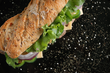 Tasty steak sandwich on black background, closeupの写真素材