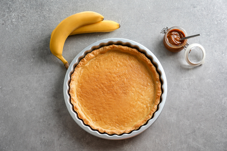 Crust for delicious banana cake on tableの写真素材