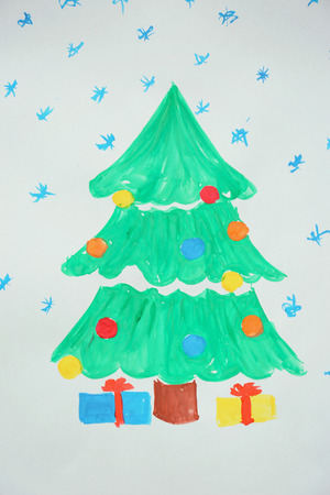Child's painting of Christmas tree with giftsの写真素材