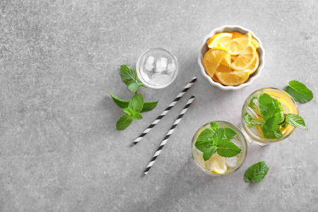 Composition with fresh mojito cocktails on grey backgroundの写真素材