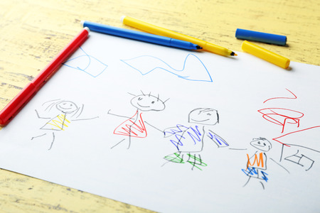 Child's drawing of family on table, closeupの写真素材