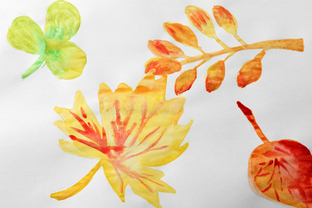 Child's painting of autumn leavesの写真素材