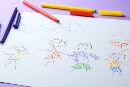 Child's drawing of family on color background, closeupの写真素材