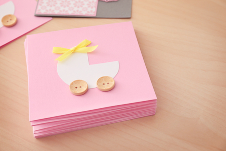 Baby shower thank you cards on wooden background