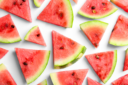Slices of ripe watermelon on white backgroundの写真素材