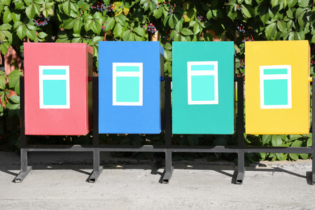 Recycling bins for different types of garbage outdoorsの写真素材
