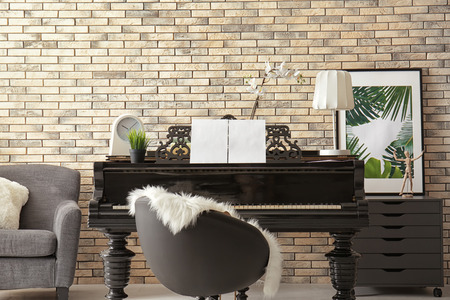 Grand piano in cozy home interiorの写真素材