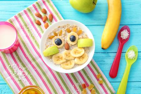 Creative oatmeal for children on tableの写真素材