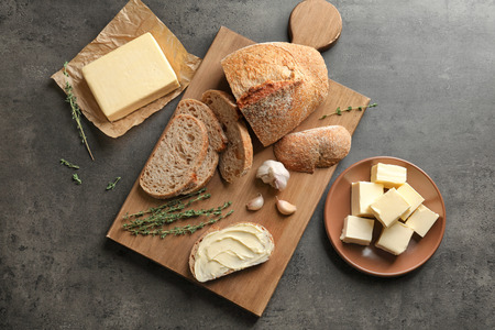 Composition with butter and bread on grey backgroundの写真素材