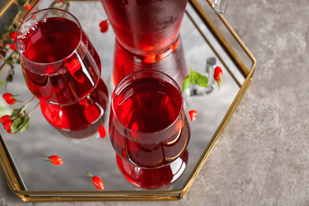 Glasses with goji juice on trayの写真素材