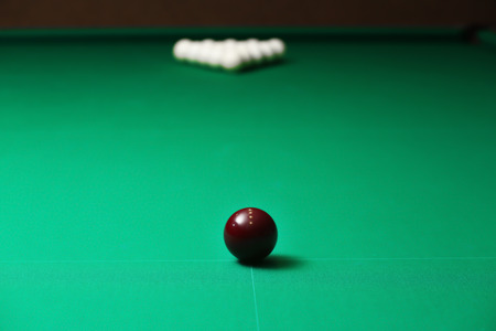 Billiard ball on green table