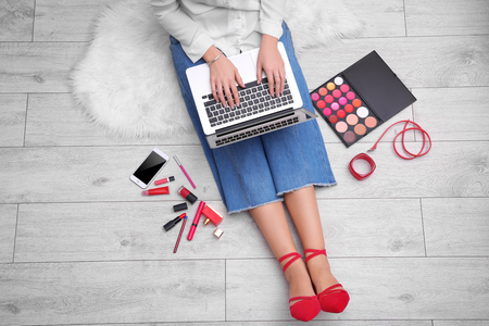 Woman using laptop at homeの写真素材