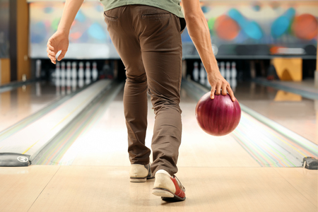 Young man at bowling clubの写真素材