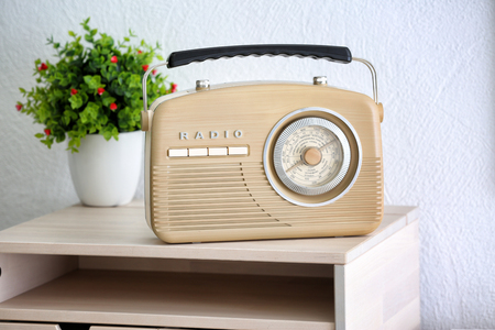 Retro radio on table in roomの写真素材