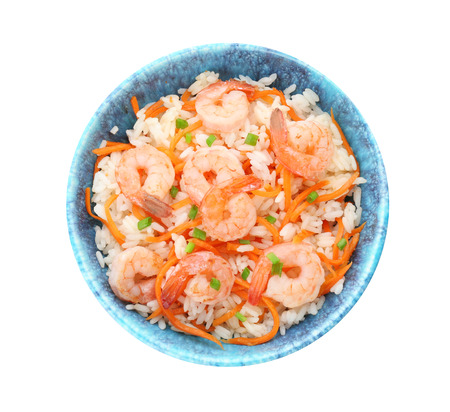 Bowl with delicious shrimp fried rice on white backgroundの写真素材