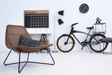 Modern living room interior with stylish bicycleの写真素材