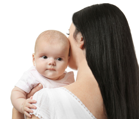 Young mother and cute baby, isolated on whiteの写真素材