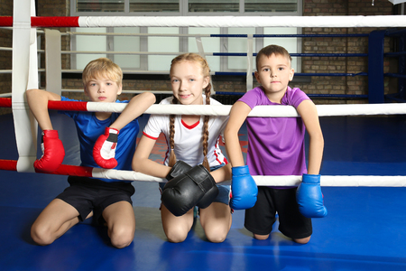 Little children in sportswear on boxing ringの写真素材