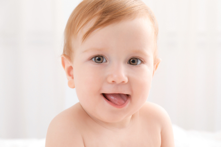Cute little baby at homeの写真素材