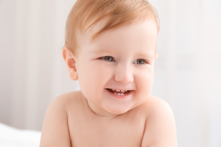 Cute little baby at homeの写真素材