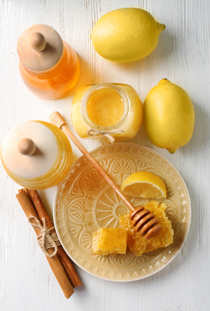 Composition with aromatic honey on tableの写真素材
