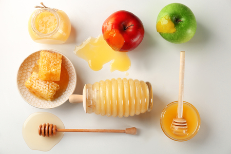 Composition with aromatic honey and fruit on white backgroundの写真素材