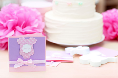 Thank you card for baby shower party on tableの写真素材