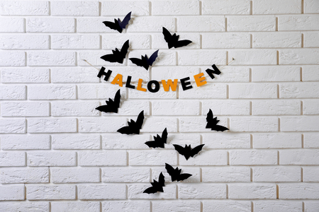 Festive decor for Halloween party on brick wallの写真素材
