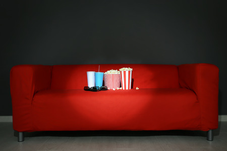 Comfortable sofa in home cinema. Movie nightの写真素材