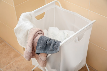 Basket with laundry indoorsの写真素材