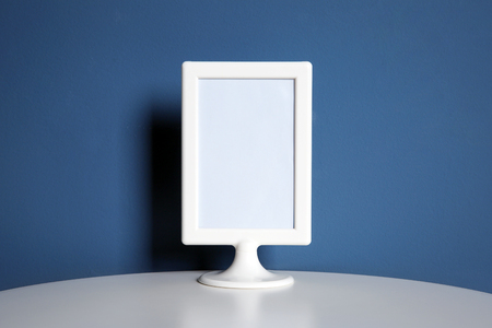 Mockup of blank frame on color backgroundの写真素材