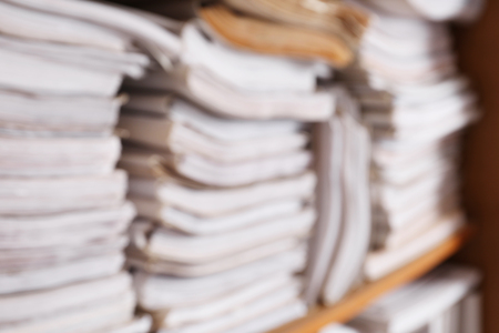 Blurred view of paper documents in archiveの写真素材