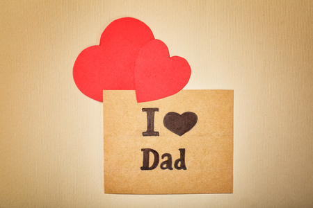 Composition with phrase I LOVE DAD for Father's Day on craft paperの写真素材