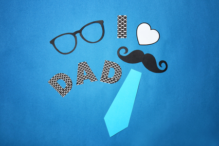 Composition with phrase I LOVE DAD for Father's Day on color backgroundの写真素材