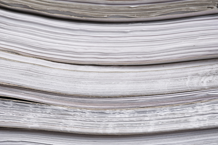 Stack of old paper documents in archive, closeup