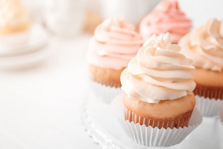 Tasty cupcakes on standの写真素材