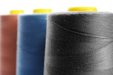Dark grey thread bobbin, closeup
