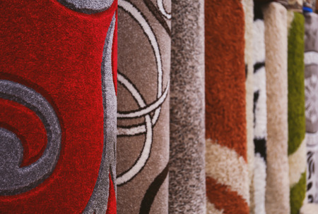 Many carpets with different patterns, closeup