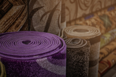 Assortment of different carpets in storeの写真素材