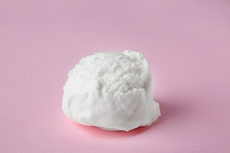 Ice cream ball on color backgroundの写真素材