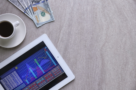 Tablet with stock data on tableの写真素材