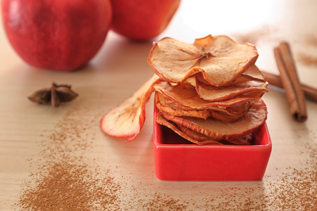 Tasty apple chips on tableの写真素材