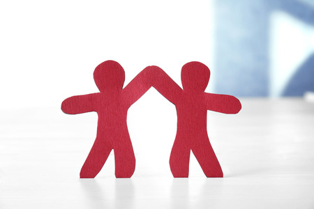 Paper people on light background. Unity conceptの写真素材