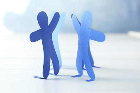 Paper people on light background. Unity conceptの写真素材