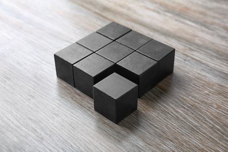 Wooden cubes on table. Unity conceptの写真素材