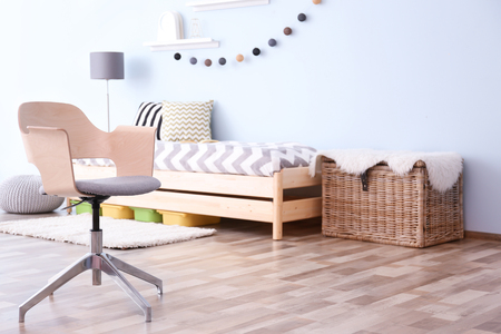 Interior of bedroom with comfortable armchairの写真素材
